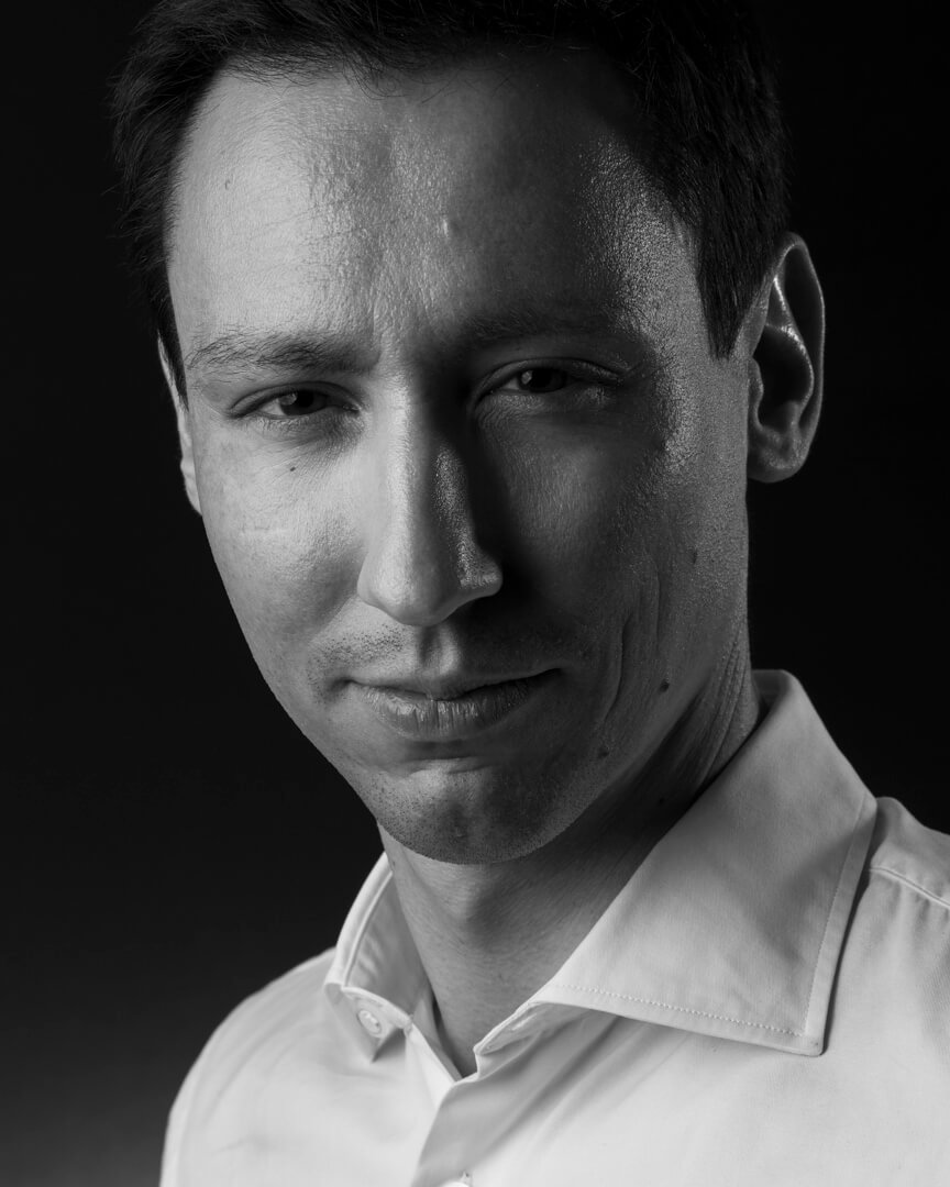 Black and white studio portrait of a man for professional audition headshot