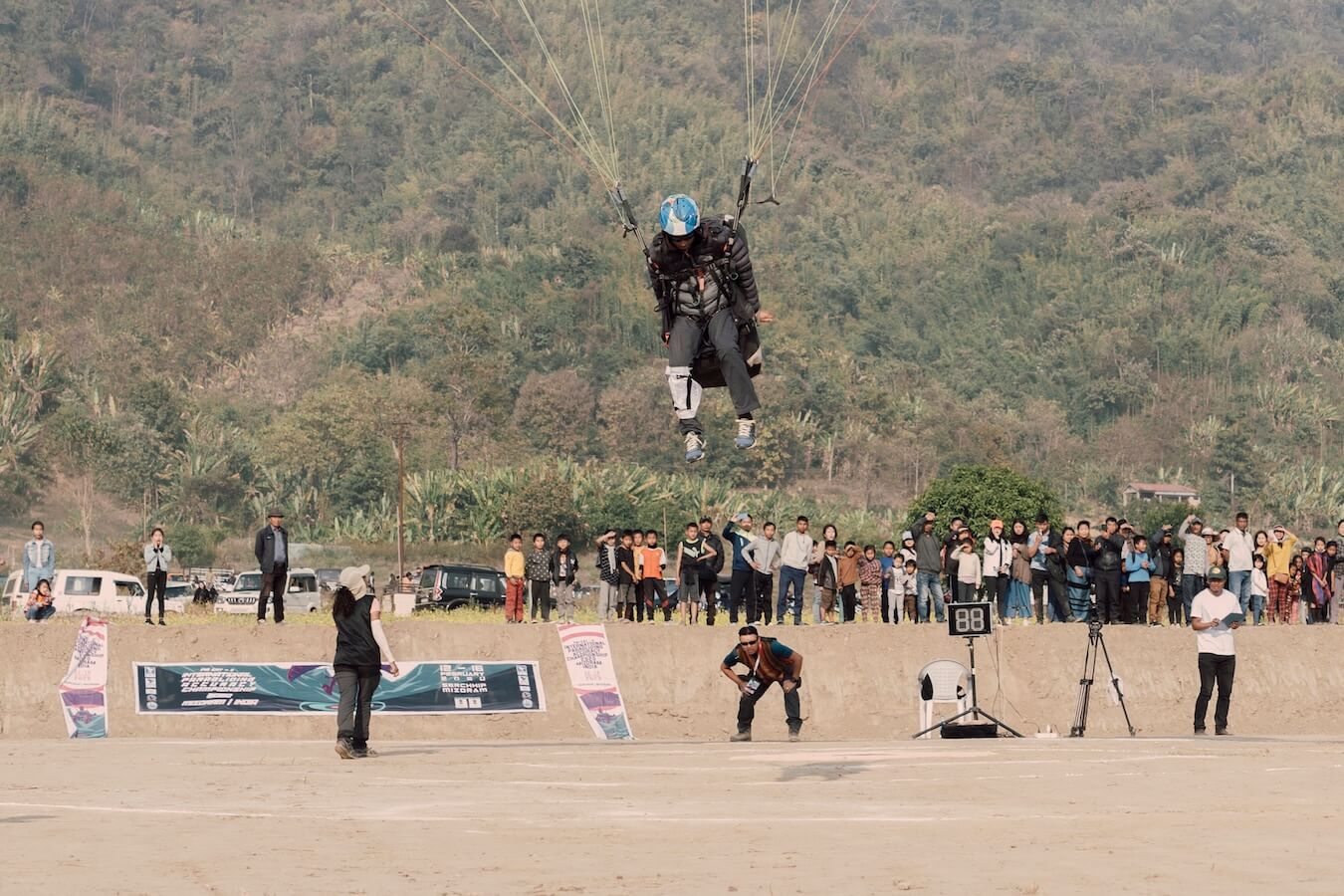 Paragliding pilot approaching the target during the Paragliding Accuracy World Cup 2020 in Mizoram, India