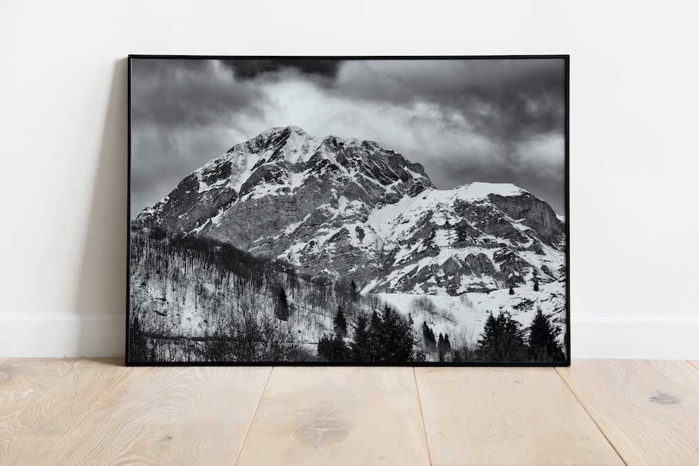 Fine art black and white photograph of a snowy mountain peak in Savoie, France, captured in timeless detail